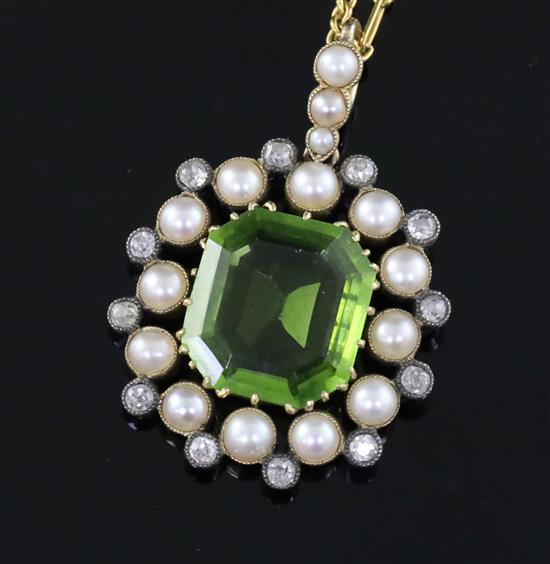 A late Victorian gold and silver, peridot, split pearl and diamond set pendant, pendant 35mm.